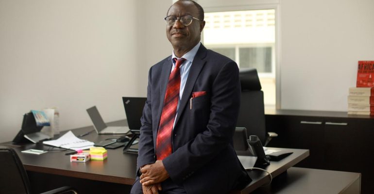 Prof Olu in his new office as the Vice Chancellor of James Hope University