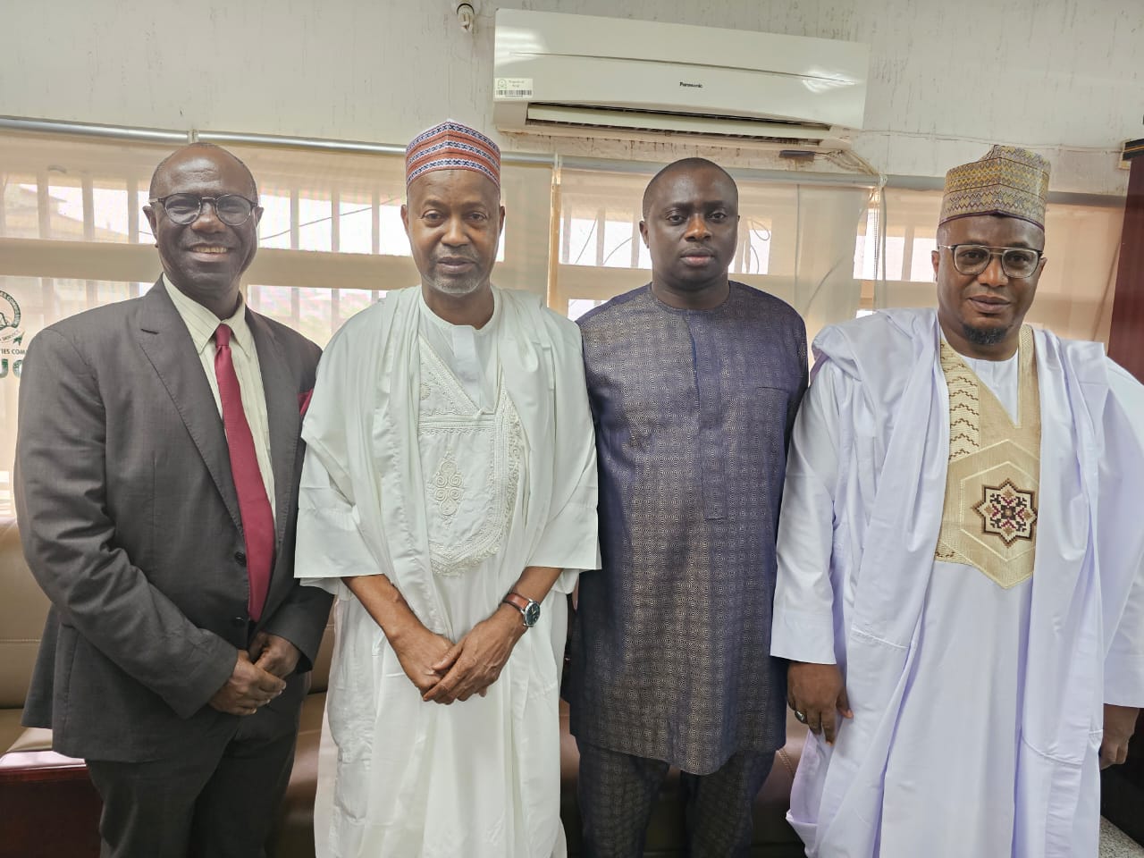 (L-R) Mr. Charles Ujomu, Chief Economist at Zenith Bank; Alhaji L.M. Faruk, NUC Director of Research and Innovation; Prof. Abdullahi Yusuf Ribadu, Executive Secretary of the NUC; and Prof. Olu Akinkugbe, President/Vice-Chancellor of James Hope University, during a courtesy visit to the NUC headquarters on April 23, 2026.